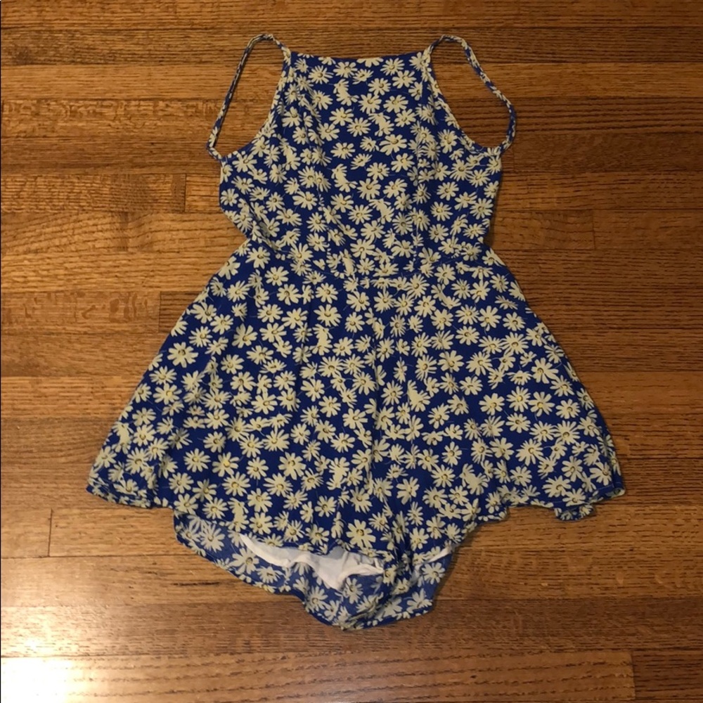 Woman’s adorable sun flower romper.